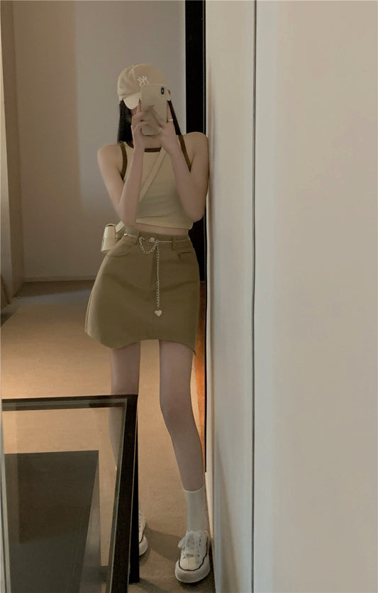 高腰不規則鍊子包臀短裙