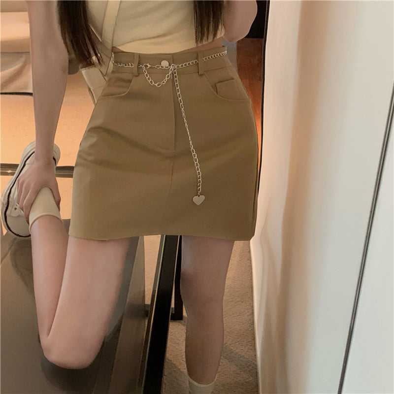 高腰不規則鍊子包臀短裙