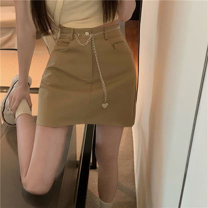 高腰不規則鍊子包臀短裙