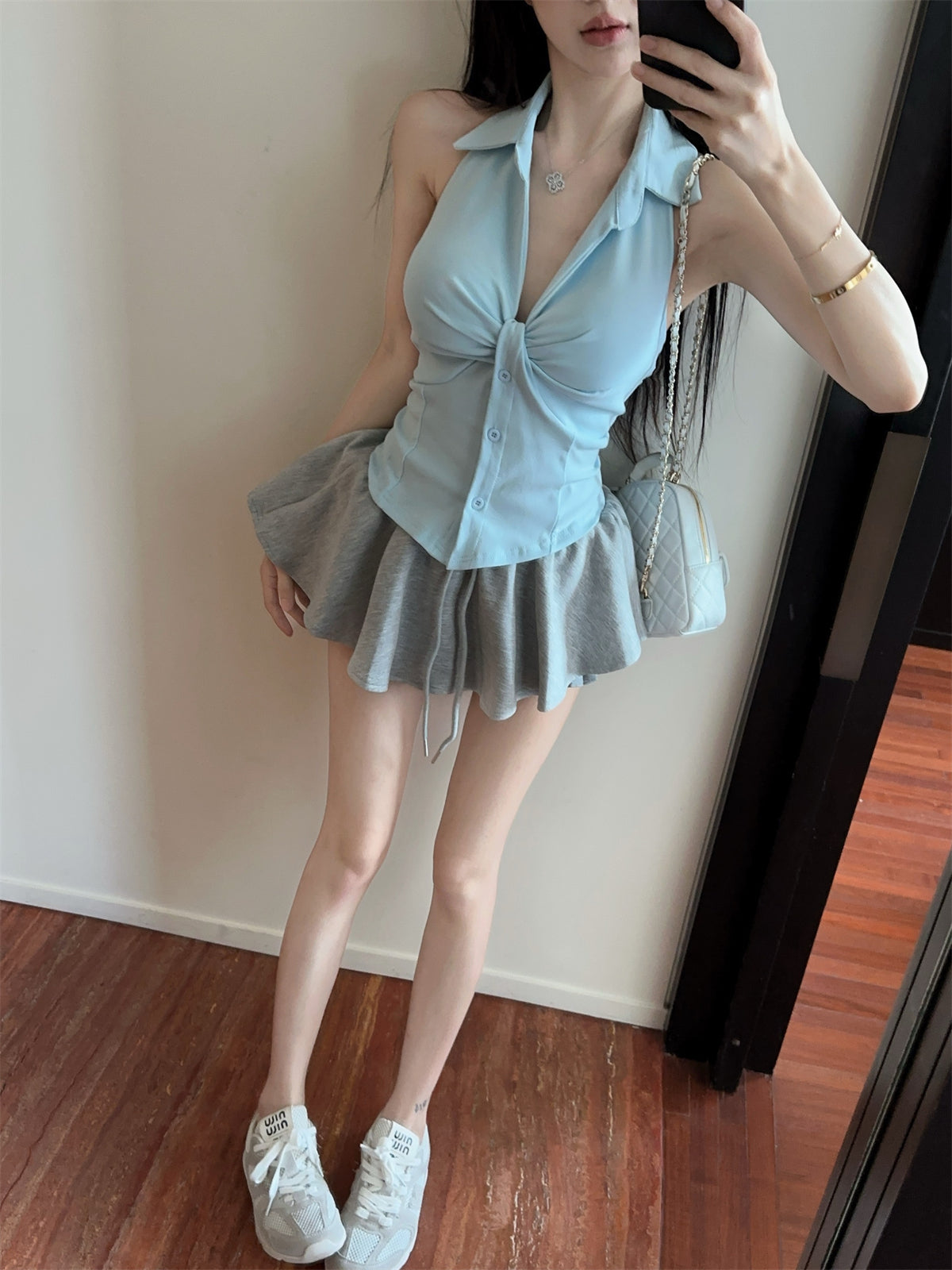扭結V領無袖露背上衣配傘裙套裝