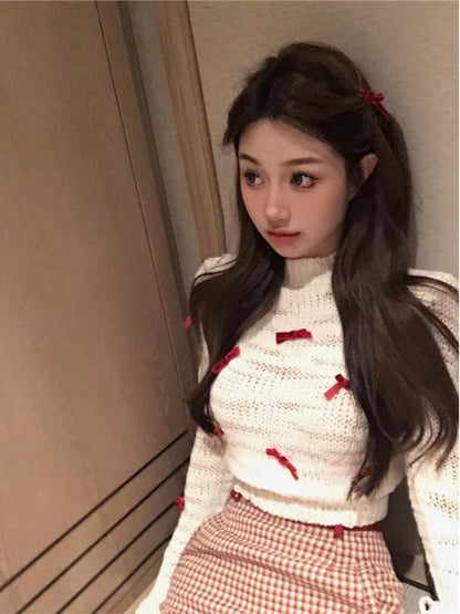 溫柔蝴蝶結白色針織配紅色包臀短裙套裝