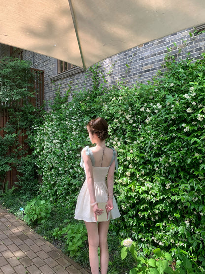 茉莉白茶花朵吊帶連身洋裝