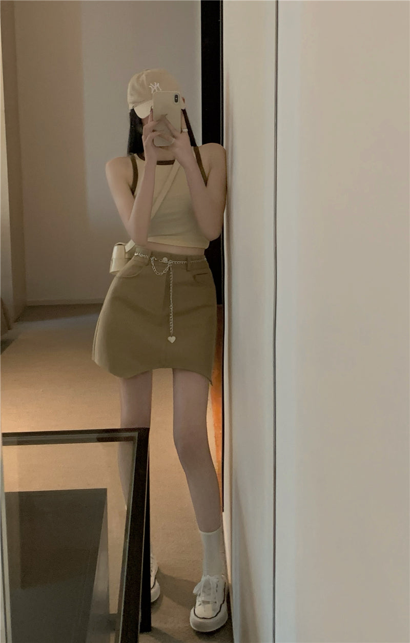高腰不規則鍊子包臀短裙