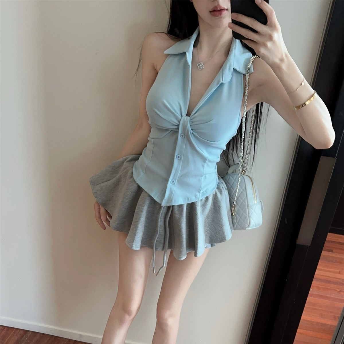 扭結V領無袖露背上衣配傘裙套裝
